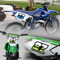 Set of three custom racing number and name decals by MC Motoparts in T16 split-fade gradient style for motocross and karting.