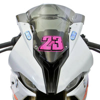 Three personalized T23 solid color racing number stickers for dirt bikes and motorcycles, shown applied to a bike.