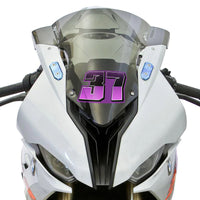 Custom racing number stickers in T27 split-fade gradient style for dirt bikes and motorcycles, shown installed on a vehicle.