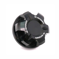 Black CNC oil filler cap for Triumph Tiger 1200, Daytona 900, Trident 660 motorcycles by MC Motoparts, durable and precise fitting.