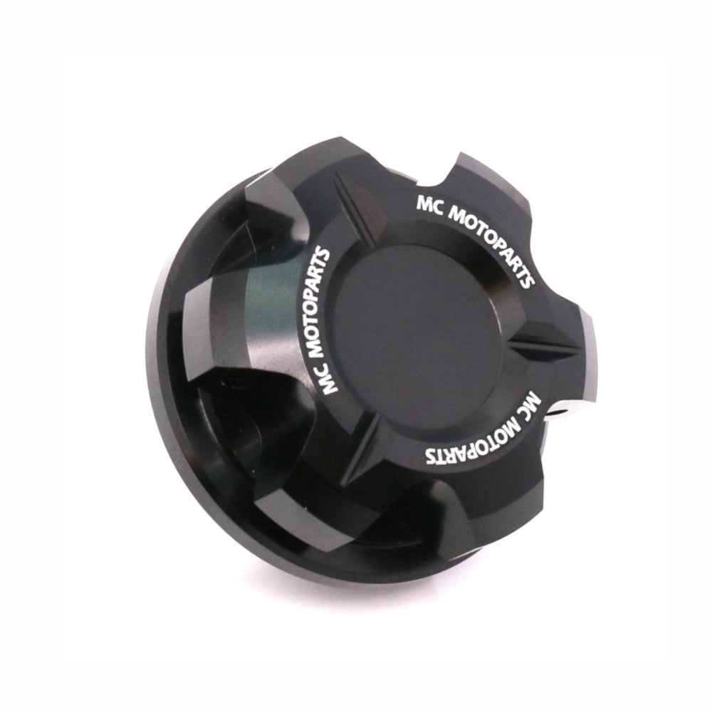 Black CNC oil filler cap for Triumph Tiger 1200, Daytona 900, Trident 660 motorcycles by MC Motoparts, durable and precise fitting.