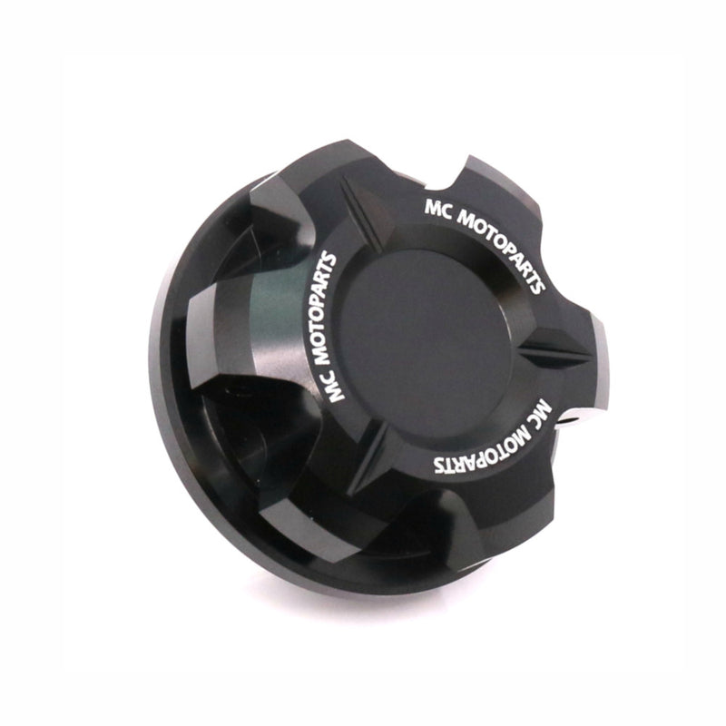Black CNC oil filler cap for Triumph Tiger 1200, Daytona 900, Trident 660 motorcycles by MC Motoparts, durable and precise fitting.