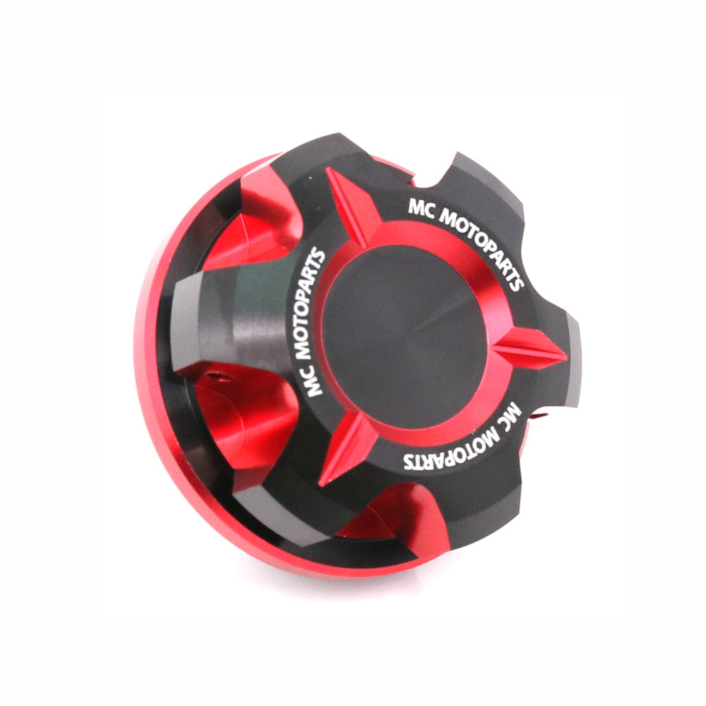 MC Motoparts CNC oil filler cap for Triumph Tiger 1200, Daytona 900, Trident 660, and Trident T-Axis motorcycle models.