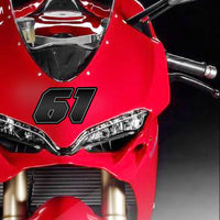 Three custom racing number stickers in G011 carbon fiber style for dirt bikes and motorcycles, personalized decals by MC Motoparts.