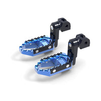 MC Motoparts 40mm extension foot pegs for Triumph Scrambler 1200, Trident 660, and TRC Touring, adjustable and durable for motorcycle riding.