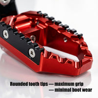MC Motoparts touring 40mm extension foot pegs for Ducati Monster 1200 821 695 TRC, wide multi-step design, front view.