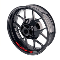 Honda CBR inner rim sticker set by StickerBao, bike-specific wheel decals with vibrant red design on a motorcycle wheel.