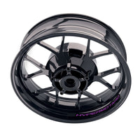 Ducati Hypermotard 1100 wheel stickers and rim decals set by StickerBao on bike wheels, showcasing model-specific rim decals.