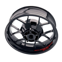 Triumph Street Triple 765 R/RS inner rim sticker set by StickerBao, featuring bike-specific wheel decals on black rims.