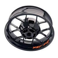 Yamaha YZF R1 wheel sticker set with bike model-specific rim decals, featuring orange and white design elements on motorcycle wheels.